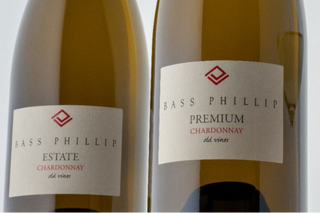 Two bottles of Bass Phillip Chardonnay wine on a light background